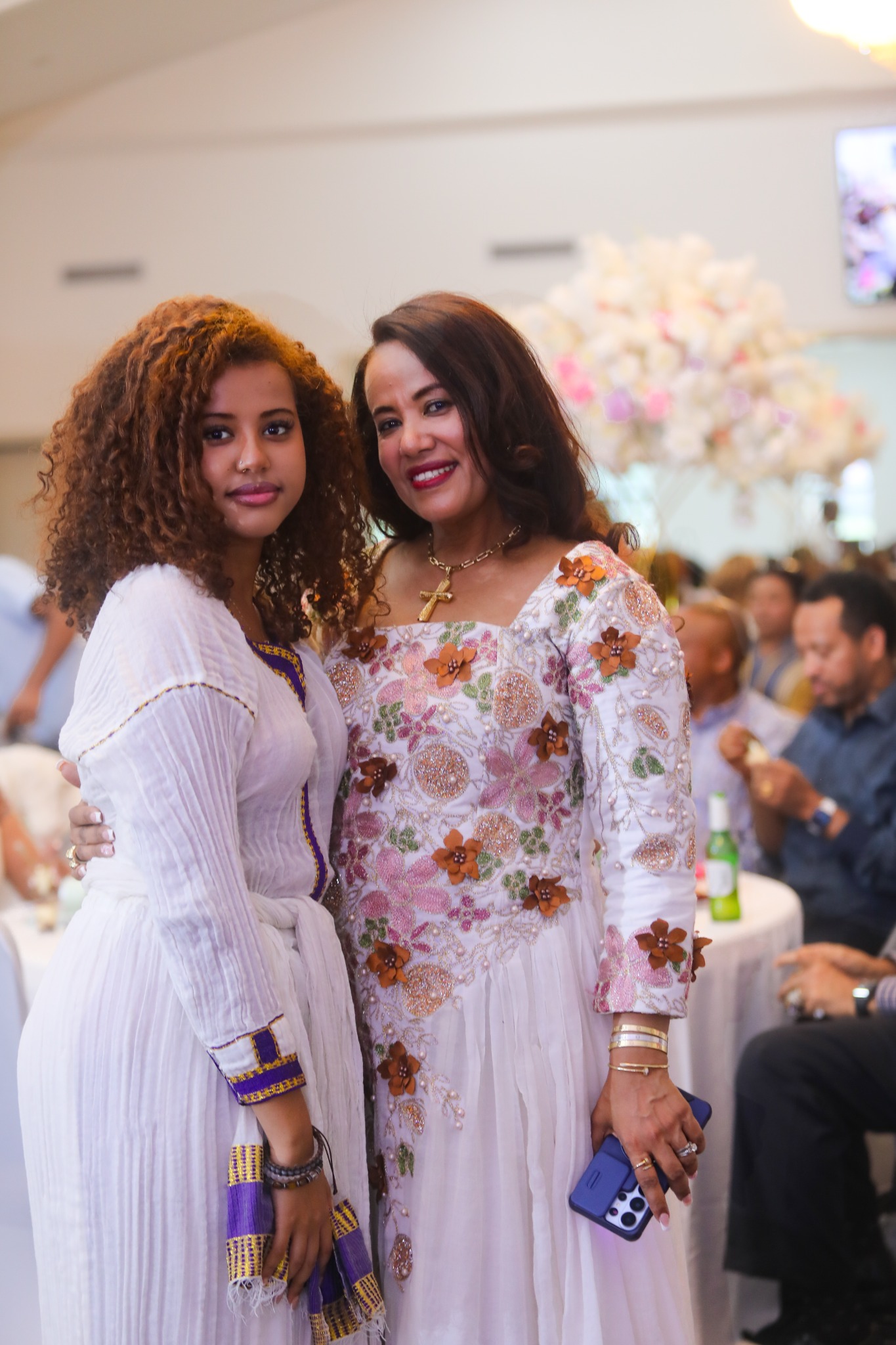 Two women marking a milestone together